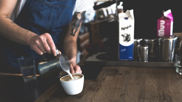 How to save money for travel - job - making coffee