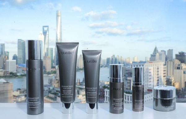 Product, Skyscraper, City, Material property, Cylinder, Cosmetics, Tower block, Cityscape, Building, 