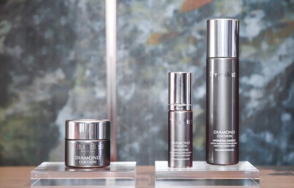 Product, Cosmetics, Beauty, Brown, Water, Lipstick, Material property, Liquid, Cylinder, Glass, 