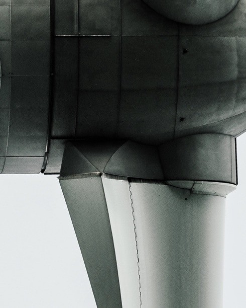 Close-up of the base of a wind turbine.