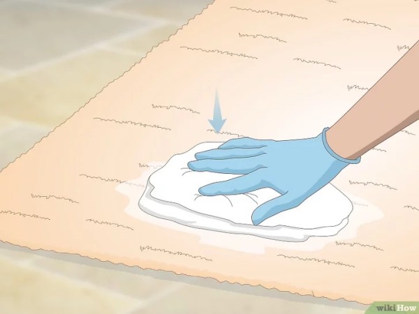 Step 3 用湿布擦掉地毯上的稠膏。