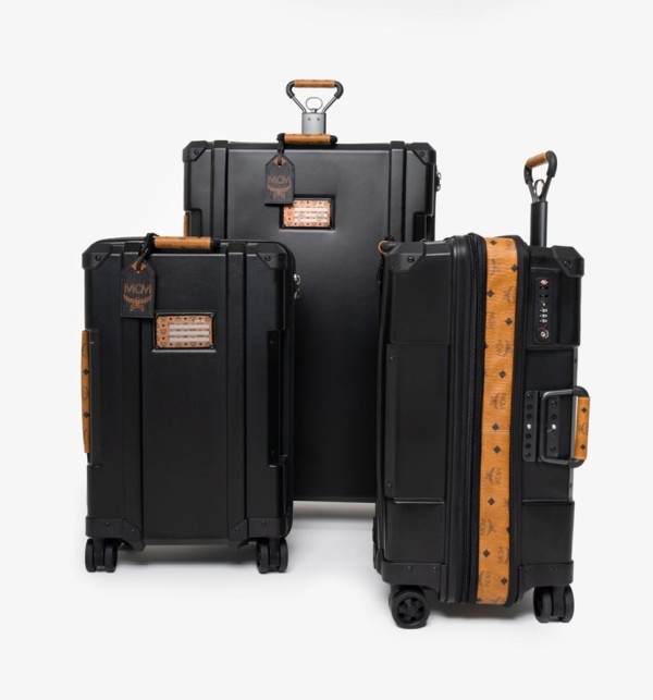 a few black luggage bags