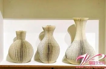 低碳生活节能环保是主题 瓶盖报纸变身创意装饰