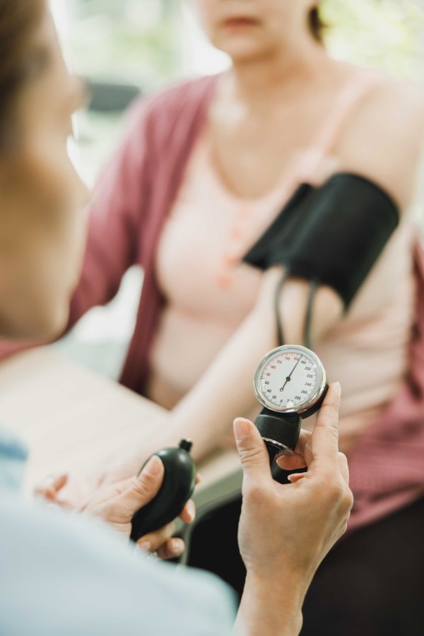 close-up-nurse-checking-blood-pressure-senior-woman.jpg