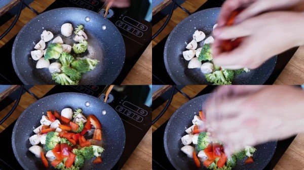 烹饪健康食品：将鸡肉和蔬菜放入锅中