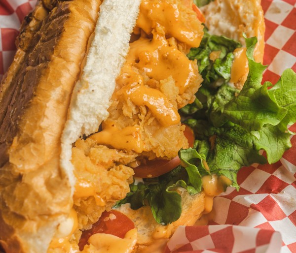 Vegan Buffalo cauliflower po'boy sandwich