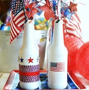 Patriotic Recycled Bottle Centerpiece1 from www.atthepicketfence.com - As the 4th of July approaches, thoughts naturally turn to celebrations filled with vibrant colors, festive foods, and, of course, patriotic decor. One of the most impactful ways to bring the spirit of Independence Day into your home is by creating a stunning 4th of July table setting that captures the essence of the holiday.