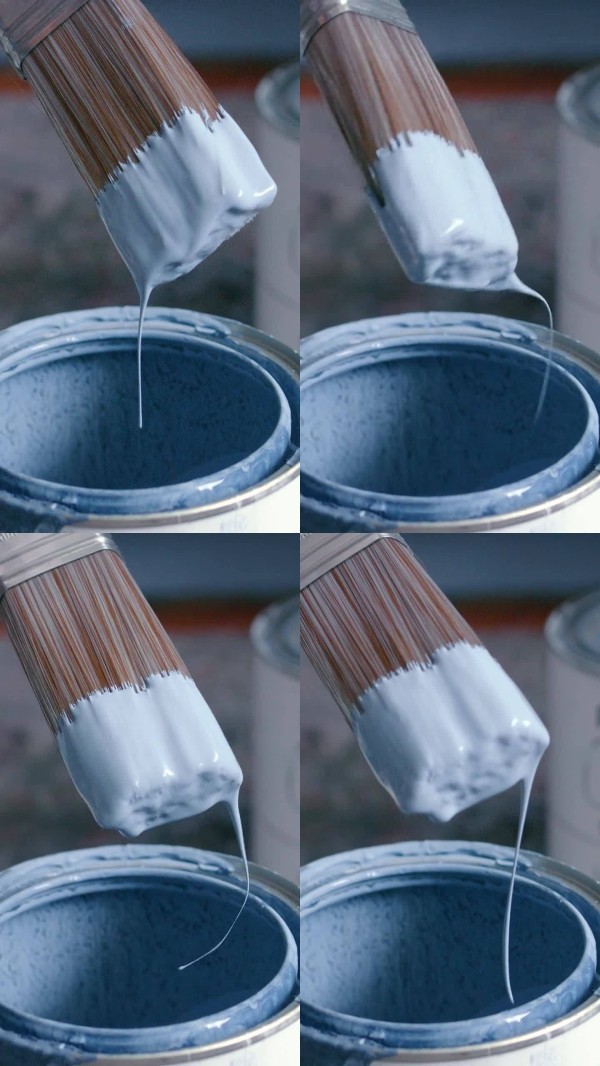油漆罐，艺术和刷蓝色液体从上方的房子或家庭diy装修或装饰。创意，改进和艺术与绘画用品在地面上的顶视