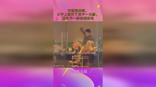 无意间拍到，女子上前打了男子一巴掌，被男子一拳击倒在地