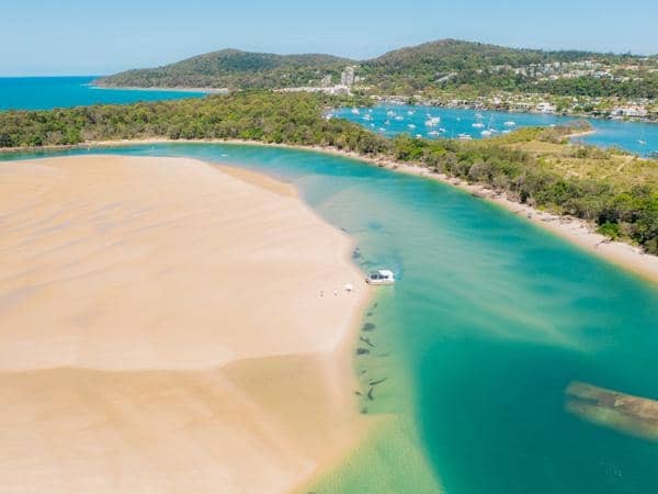 Swirling shades of turquoise in noosa river image tourism and events queensland