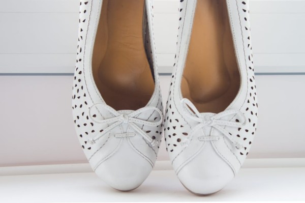 universal leather orthopedic insoles for everyday wear inside white shoes