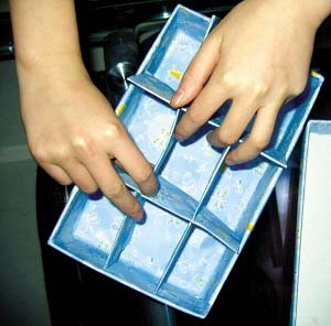如何巧用废品自制个性收纳盒