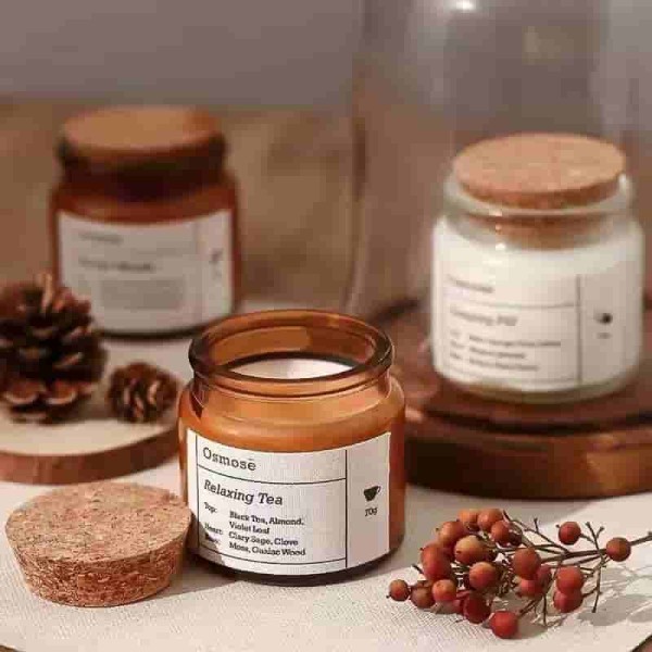 clear and amber glass candle jar with cork lid