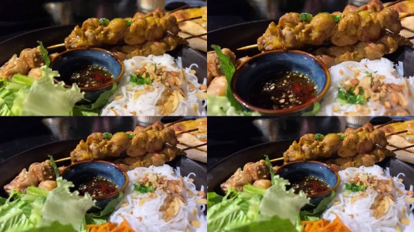 在家庭餐桌上享用新鲜的传统亚洲美食。烹饪健康美味的亚洲风味菜肴。美味的开胃菜：炒面配调味蔬菜和美味鸡