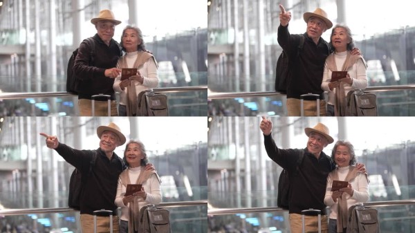 老年亚洲夫妇带着行李在机场检查护照，规划旅行，展示旅行准备，享受退休生活，国际旅行，安全旅行，老年旅