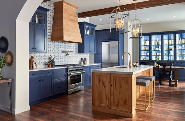 dark-blue-Spanish-kitchen-cabinets-with-rustic-wood-island