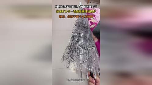 妈妈看孩子在雨伞上画图案就生气，结果打开伞一看感觉画得还挺好