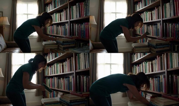 女子在家整理书架 书房阅读与知识管理