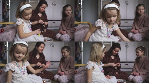 家庭与孩子们一起制作节日装饰，为圣诞节做准备。