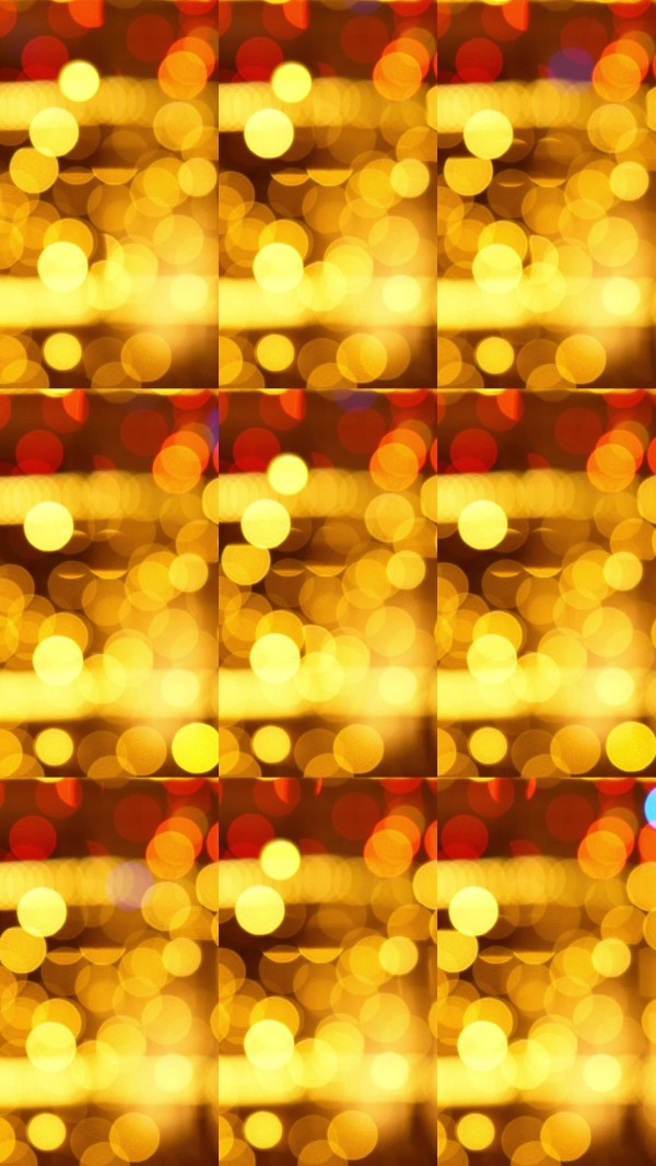 黄色的散景季节性装饰品在节日期间唤起节日和舒适的氛围，零售空间中的节日季节性装饰品增强了节日的愉快和