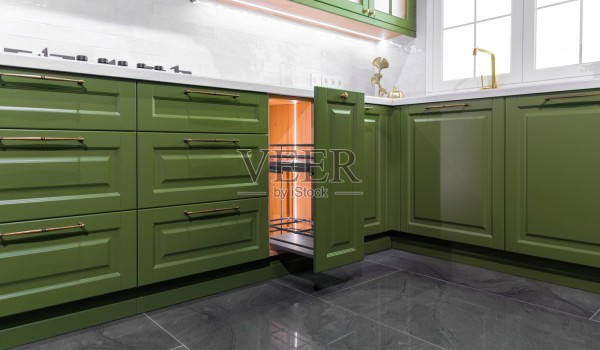 橄榄绿新古典风格橱柜,配有拉出式储物篮照片摄影图片